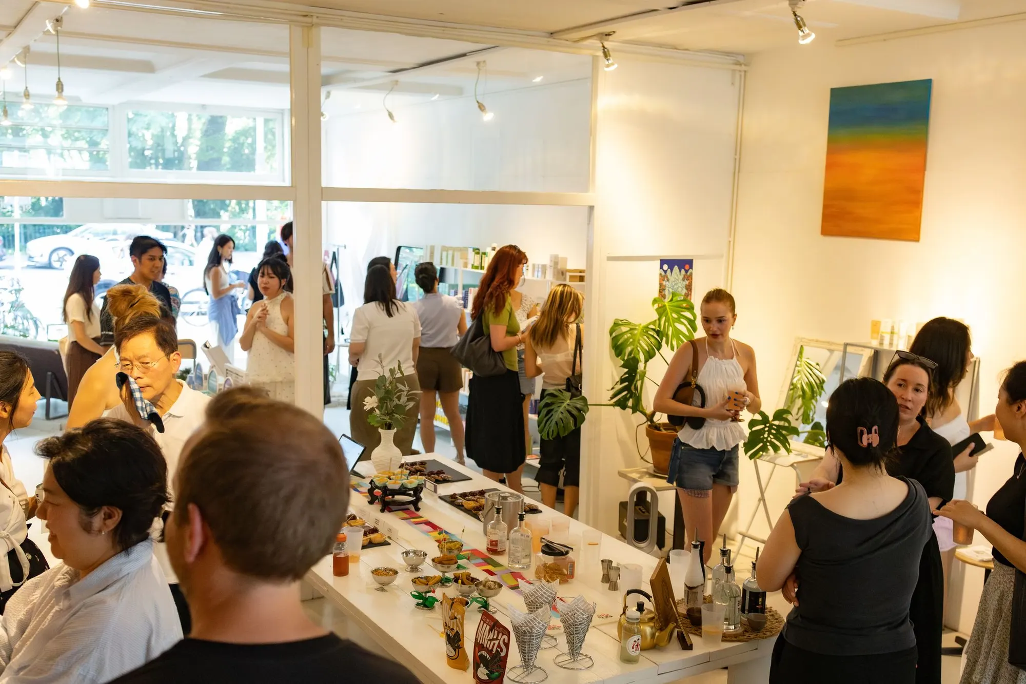 Guests exploring products at a Heyday Presents pop-up in Amsterdam